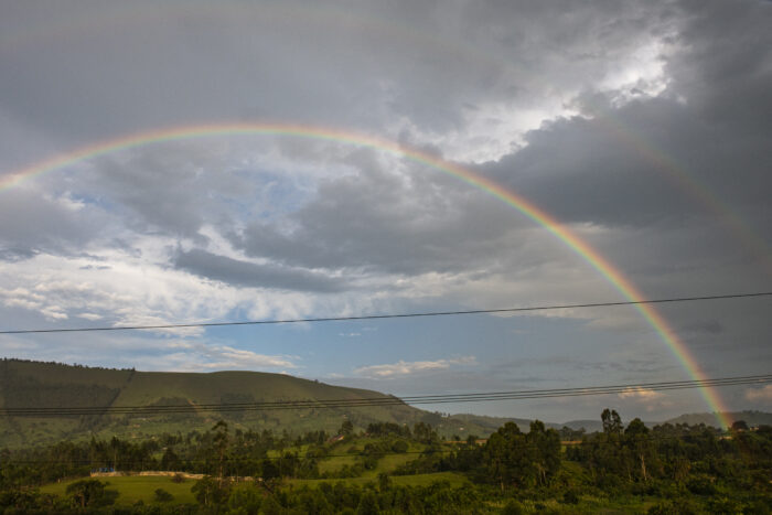 Ugandan landscape with hills and rainbow