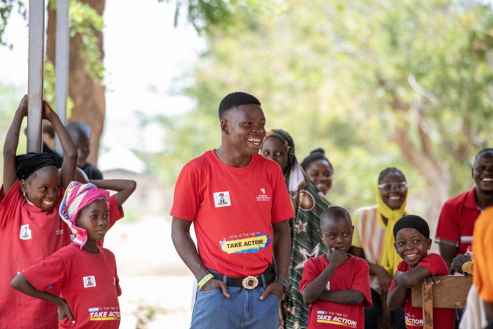 Peer support leader with children at a teen club 